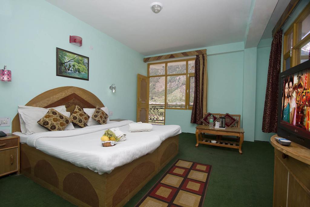 Hotel Ocean Inn Manāli Quarto foto