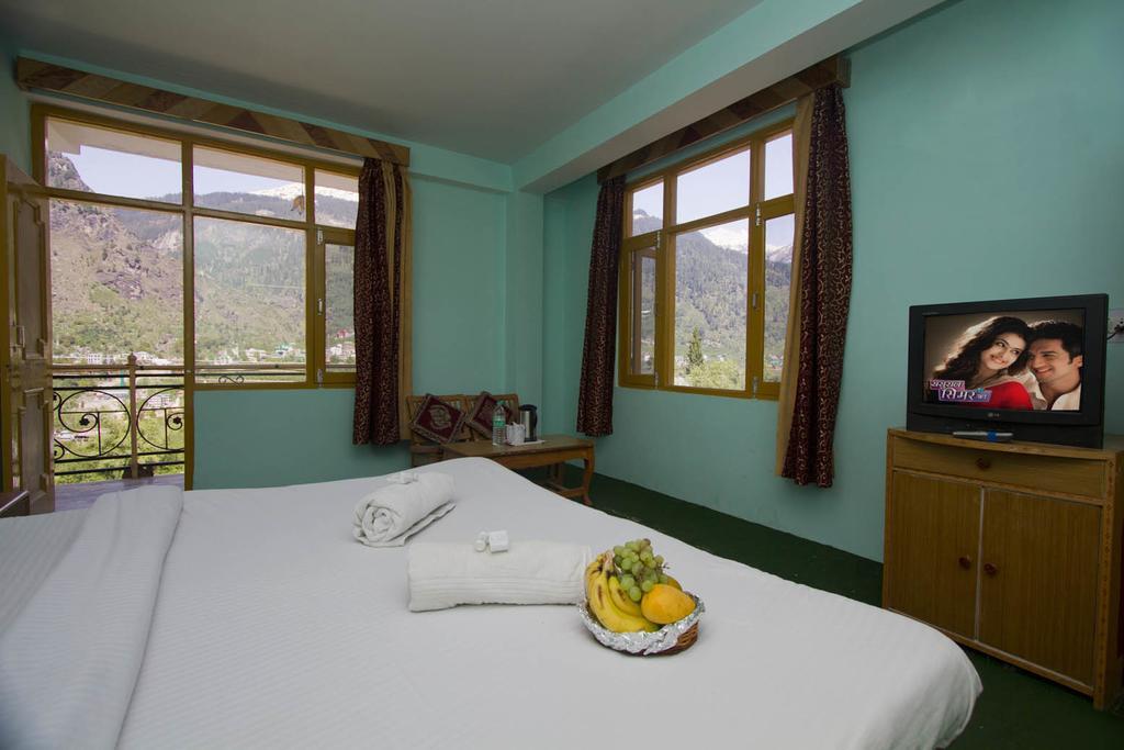 Hotel Ocean Inn Manāli Quarto foto